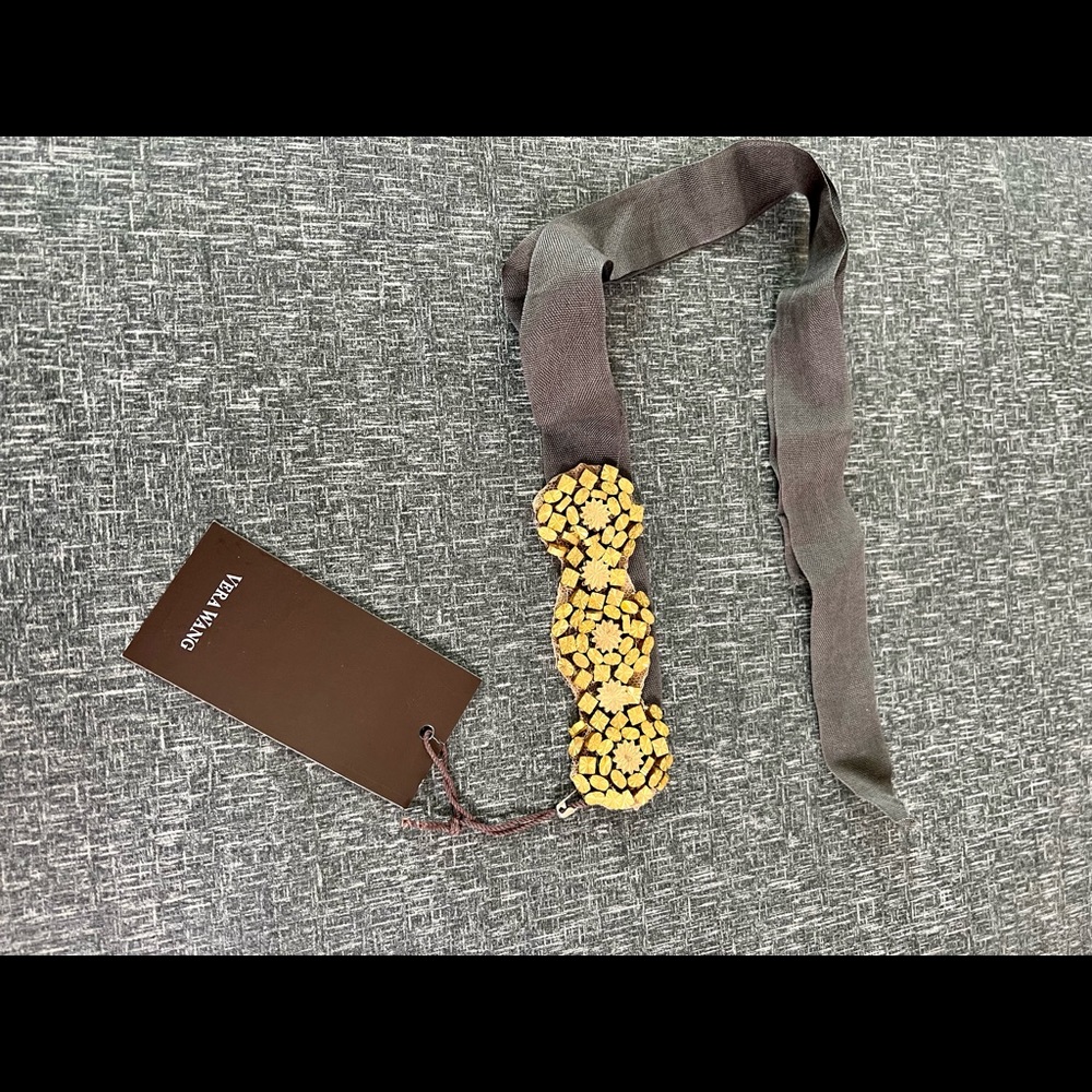NWT Vera Wang belt/head piece with gold toned beaded detail. One Size